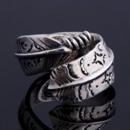 ROLLED FEATHER RING